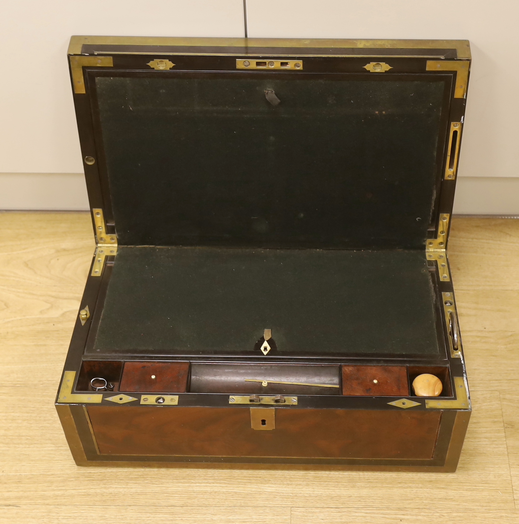 A George III mahogany, ebony and brass-mounted ship's writing box by Wells & Co., screw fixings to each side with original key, 50.5cm x 30cm x 19.5cm